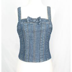 Denim Crop Top From Marc Jacobs In Women's Size 4 (Approx. Size Small, But Please Check Measurements Or Be Familiar With Mj Sizing Before Purchase). Condition Is Excellent, Looks Nearly Brand New. No Flaws Or Wear. Features: Sleeveless With Non-Adjustable Straps Cute Bow / Ribbon Detail Above The Bust Contrast Stitching For A Fabulous Bustier Style Look Zipper Back Unsure Of The Year, But I Purchased This Pre-Owned In 2007, So It Is 2007 Or Earlier. 100% Cotton Machine Wash Pictured On A Size 2- Fitted Cotton Denim Top, Trendy Fitted Cotton Denim Top, Vintage Fitted Denim Top For Spring, Fitted Denim Blue Cotton Top, Fitted Cotton Denim Top For Summer, Fitted Vintage Medium Wash Top, Fitted Cotton Denim Vest For Summer, Fitted Blue Cotton Denim Vest, Vintage Fitted Denim Tops