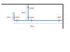 an image of a room with measurements for the wall and floor area in front of it