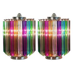 pair of multicolored glass table lamps on chrome bases