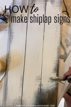 how to make shiplap signs with white paint and black lettering on the side