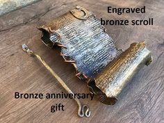 an old purse is sitting on top of a table with the words, bronze anniversary gift