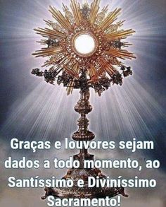 a cross with the words in spanish above it and an image of a sunburst