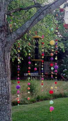 a tree that has some balls hanging from it