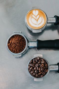 three different types of coffee on a table