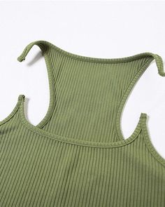 Details: Cami top with sabertooth-like designTop Length: NormalSleeve Length: SleevelessMaterials:95% Polyester + 5% Spandex Green Racerback Vest Top, Green Stretch Racerback Tops, Green High Stretch Sleeveless Tops, Green Vest Tops With Tank Straps, Green Stretch Crop Top With Tank Straps, Green Casual High Stretch Tank Top, Casual High-stretch Green Tank Top, Skirt Heels, Maxi Dresses Casual