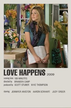 the poster for love happens shows an image of a woman holding a book in her hands