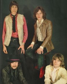 the rolling stones are posing for a portrait