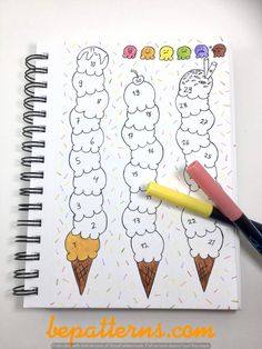 a notebook with numbers and ice cream cones on it