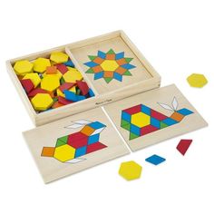 three wooden puzzles with different shapes and sizes