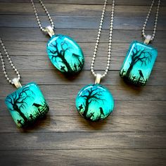 "Spooky Tree Twilight Resin Pendant. This pendant is made from resin and has a fresh, contemporary look. Features a hand painted spooky tree in a field set against a multi-layered twilight scene.  Every pendant is hand painted so the branches and layout will differ slightly each time -  therefore you will own a true one of a kind! Reverse side is white and covered in fine iridescent glitter. Pendant is extremely light to wear and smooth to touch. Available in 4 shapes: rectangle, square, oval an Hand Painted Jewelry For Halloween Gift, Whimsical Black Necklace For Gift, Handmade Resin Jewelry For Halloween, Halloween Resin Jewelry Gift, Halloween Gift Resin Jewelry, Hand Painted Artsy Resin Jewelry, Artsy Hand Painted Resin Jewelry, God Crafts, Tree In A Field