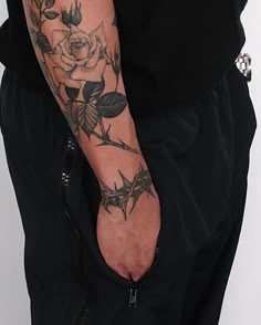 a man with a tattoo on his arm