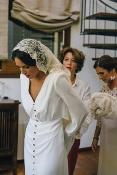 the bride is getting ready to walk down the aisle