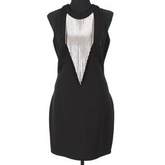 Balmain Black Mini Dress Embellished Neckline New With The Tags 100% Authentic Size: 40 Material: 87% Viscose, 8% Polyamide & 5% Elastane Embellishment: 45% Crystal, 39% Copper & 15% Zinc Dry Clean Black Fitted Dress Sleeveless Exposed Silver Back Zipper Attached Embellished Neckline New With The Tags, Never Worn! Approx. Measurements: Across The Underarms: 16" Length Down The Center Back: 33.5" Silver Cocktail Dress With Rhinestone Fringe, Silver Rhinestone Fringe Dress For Cocktail, Silver Rhinestone Fringe Cocktail Dress, Elegant Silver Mini Dress With Rhinestone Fringe, Elegant Silver Embellished Mini Dress, Silver Evening Dress With Rhinestone Fringe, Silver Embellished Dress For Holiday Party, Black Cocktail Dress With Rhinestone Fringe, Black Fitted Dress