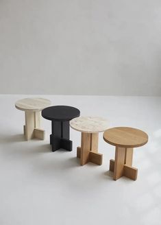 three small tables sitting next to each other