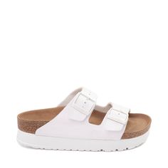 White Synthetic Double Strap Footbed Sandals, White Double Strap Footbed Sandals, White Adjustable Double Strap Footbed Sandals, Comfortable White Synthetic Footbed Sandals, White Adjustable Casual Footbed Sandals, Comfortable White Double Strap Sandals, Casual White Slides With Cork-bed Midsoles, White Double Strap Sandals With Cork-bed Midsoles, White Comfortable Double Strap Sandals