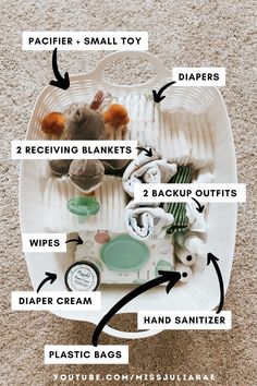 the contents of a baby's diaper bag are labeled in black and white