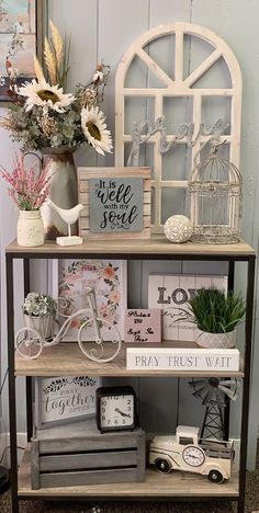 a shelf filled with books and other items