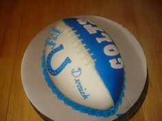 a birthday cake with a football on it