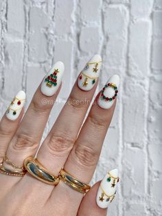 "These Christmas tree press on nails are perfect to complete your look for the holidays! All my press on nail sets are made to order and custom tailored specifically to your size and liking. They are handmade and carefully crafted to make you a unique, personalized product. Made with high quality nail tips molded with soft gel and hand painted with salon quality products to make the nails sturdy and reusable. My press on nails last up to 4 weeks or more of continuous wear with correct nail prep and can be reused and reapplied 4-5 times more. 💅What's included in your order * Each nail set is delivered in a box perfect for storage or gifting * Your 10 nail set order custom made for you * Buffer * File * Alcohol pad * Cuticle orange wood stick * Nail glue * Application/ removal/ care instruc Christmas Nails With Rhinestones, Christmas Ornament Nails, Nutcracker Nails, Era Nails, Stars Nails, Nail Art Noel, Hair Tricks, Nails Holiday, Christmas Tree Nails