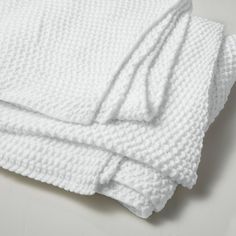 white towels folded on top of each other