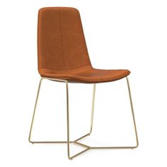 a brown chair sitting on top of a metal frame