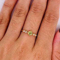 14k Solid Yellow Gold Ring Point Peridot & Studded With SI Clarity, G-H Color Diamond Wedding Gift Ring  ≫ Features * Gemstone : Genuine Peridot  * Stone size : 5x5 mm * Diamond Cut: Brilliant Cut (Excellent) * Real Earth Mines Diamond * Diamond Color: G-H * Diamond Clarity: SI * 14K Solid Yellow Gold (With Stamped)  * Available in 14K & 18K Yellow, Rose, and White Gold  * Option available in 18K Gold * All size available * Ready to Ship in 1-2 Weeks ≫ FAQ below for more detail. ✦ Sizing We can adjust most items to fit your sizing preferences. Most items can be made to any size and length. Please leave a note at checkout or contact us via Etsy conversation. Even after purchasing the item, you can still ask us to adjust the size or length. We will try our best to fix it if it is possible. ★ Real Earth, Peridot Stone, Gift Ring, Yellow Gold Ring, Diamond Color, Yellow Rose, Diamond Clarity, Solid Yellow, Diamond Cut