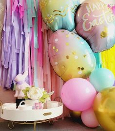 balloons and streamers are on display at a birthday party