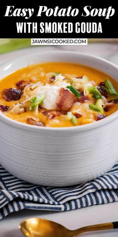 easy potato soup with smoked goulash in a white bowl on a blue and white striped napkin