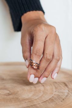 Embrace and tap into the ever-present wisdom of life’s phases with this subtly glamorous Triple Goddess Gemstone Ring. This popular magick symbol represents both the three main phases of the moon (waxing, full and waning) and the phases of a woman’s life known as The Maiden, The Mother, and The Crone. The perfect balance of glam and subtlety, the Triple Goddess Symbol is set elegantly in the middle of the ring, highlighted by a stunning crystal white moissanite stone. This ring is perfect for ad Triple Goddess Symbol, Gaudy Jewelry, Goddess Symbols, Magick Symbols, How To Wear Rings, Goddess Necklace, Mini Studs, Triple Goddess, Gold Gemstone Ring