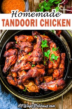 homemade tandoori chicken in a pan on a wooden table