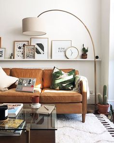 a living room filled with furniture and decor