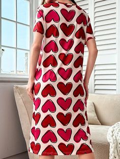 Stay warm and stylish with our Heart Print Nightdress, the perfect pajama for cozy nights. This nightdress features a heart print design, ensuring a comfortable and cute fit. Made with soft and luxurious material, it's the ideal choice for a good night's sleep. Color : Multicolor Style : Casual-Young Pattern Type : Heart Pattern Type : All Over Print Type : Sleepshirts Neckline : Round Neck Sleeve Length : Short Sleeve Sleeve Type : Drop Shoulder Length : Midi Fit Type : Loose Fabric : Slight Stretch Material : Knitted Fabric Composition : 95% Polyester Composition : 5% Elastane Care Instructions : Machine wash or professional dry clean Sheer : No Size US Bust Cuff Length Shoulder Sleeve Length S 4 104 37 112 45 17 M 6 108 38.4 114 46 17.6 L 8/10 114 40.6 116 47 18.3 XL 12 120 42.8 118 48 Pink Heart Print Sleepwear For Pajama Party, Pink Sleepwear For Valentine's Day, Pink Valentine's Day Sleepwear, Casual Sleepwear For Valentine's Pajama Party, Casual Valentine's Day Sleepwear For Pajama Party, Valentine's Day Casual Sleepwear For Pajama Party, Casual Sleepwear For Valentine's Day Loungewear, Valentine's Day Heart Print Sleepwear, Pink Sleepwear For Valentine's Day Pajama Party