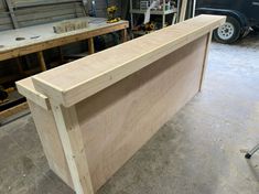 a large wooden counter in a garage