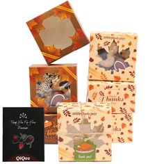 four boxes with thanksgiving greeting cards in them