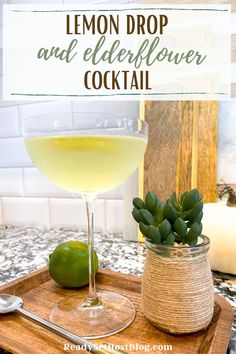 a lemon drop and elderflower cocktail on a tray