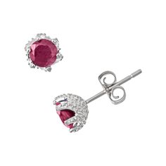 Dazzle them. Round-cut ruby stones give these stud earrings a captivating glow. You'll be the center of attention every time you wear these sterling silver studs.    Studded details accent the sides of the six-prong settings.    Earrings come in a gift box.    Details:            7-mm diameter        Pierced        Post backings        Rhodium-plated sterling silver         Size: One Size. Gender: unisex. Age Group: adult. Ruby Earrings With Prong Setting In Round Cut, Ruby Earrings With Prong Setting And Round Cut, Ruby Earrings With Round Cut And Prong Setting, Silver Earrings With Lab-created Ruby In Fine Jewelry Style, Silver Lab-created Ruby Earrings For Anniversary, Silver Earrings With Lab-created Ruby For Anniversary, White Gold Ruby Earrings With Prong Setting, Silver Earrings With Lab-created Ruby, Silver Anniversary Earrings With Lab-created Ruby