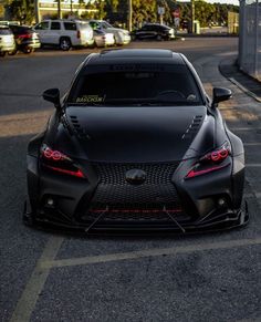 a black sports car parked on the street