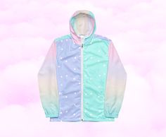 This lightweight windbreaker ensures maximum comfort on windy, rainy, and sunny days, thanks to the water-resistant fabric and breathable mesh lining. The windbreaker has an effortless look that will fit different styles and can be easily layered with long and short sleeve shirts.  * 100% polyester * Fabric weight: 2.21 oz/yd² (75 g/m²) * Lightweight, water-resistant fabric * Breathable mesh lining, reduces static * Regular fit * Elastic cuffs * Hood and side pockets * Zippable front * Blank pro Spring Nylon Windbreaker For Rainy Weather, Nylon Long Sleeve Windbreaker For Rainy Season, Long Sleeve Nylon Windbreaker For Rainy Season, Sporty Windbreaker For Spring Rainy Weather, Sporty Spring Windbreaker For Rainy Weather, Spring Multicolor Nylon Windbreaker, Spring Green Windproof Windbreaker, Casual Nylon Windbreaker For Rainy Season, Spring Waterproof Nylon Windbreaker