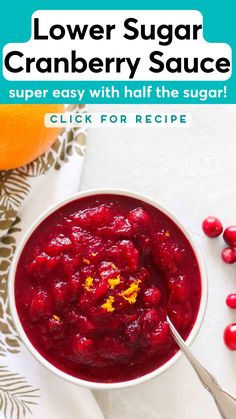 cranberry sauce in a white bowl with text overlay that reads, lower sugar cranberry sauce super easy with half the sugar click for recipe