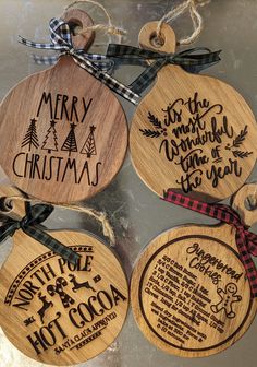 four wooden christmas ornament hanging from a string