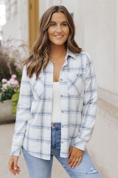 Upgrade your layering game with our Navy Plaid Shacket! This versatile piece features a classic collared neckline, button down front, and chest pockets. Keep warm with the long sleeve design and elevate any outfit with the allover plaid pattern. Perfect for effortless and stylish layering. Layer it over a basic long sleeve top, jeans, and comfy sneakers for a chic everyday outfit!