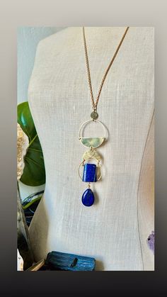 "Lapis Lazuli Bohemian Necklace, Lapis Lazuli pendant necklace, Boho Chic Gemstone necklace, blue gemstone necklace, black owned jewelry shop La Touche Designs original.   From my new collection; vintage chain and gem 🌿Lapis Lazuli gemstone 🌿Solid brass parts and chain 🌿Pendant: 6\" long Studio La Touche is a Black owned, artist's jewelry shop, based in South Florida, USA     ☀️Brass lobster clasp closure  🌿Chain: solid brass, naturally nickel-free and polishable.  🎁gift box included ✅Homep Handmade Bohemian Sapphire Necklace, Artisan Lapis Lazuli Pendant Necklace, Bohemian Sapphire Necklaces With Natural Stones, Blue Lapis Lazuli Jewelry, Brass Necklaces With Gemstone Round Pendant, Bohemian Lapis Lazuli Teardrop Jewelry, Brass Gemstone Necklace With Round Pendant, Artisan Blue Teardrop Pendant Necklaces, Brass Necklace With Round Gemstone Pendant