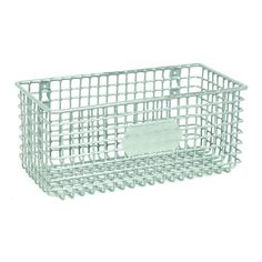 a white wire basket with a napkin in it