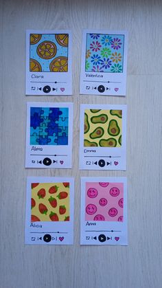 four cards with pictures of different fruits and vegetables on them, all in bright colors