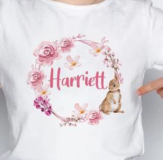 We have this lovely Personalised Easter T-shirt for you to use this easter, dress your girls in this lovely top for your little easter party. These cute Rabbit Easter Tops are super cute and will become their favourite top. Girls Easter Tops in a white with a direct print. Suitable as Easter Clothing and a Toddler Easter T-shirt. Please note the Baby sizes are for a vest and the bigger sizes are for a t-shirt- the options dropdown will help you with this. KEY FEATURES * 100% Ringspun Combed Cotton - soft, comfortable T-Shirt * Matching Designs Available * Size Range Age Years 0-13 available * Machine Washable 30 Degrees inside out Features: - 100% Combed and Ringspun Cotton - 200gsm (approx) - Supersoft - Wash care label - 3 nickel free press buttons - Weight 145gsm - Wash at 30 degrees, i Easter Clothing, Easter Tops, Toddler Top, The Only Exception, Toddler Easter, Easter T Shirts, Rabbit Easter, Digital Elements, Top Girls