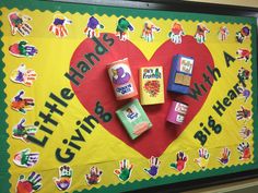 a bulletin board with handprints on it that says, little giving walla