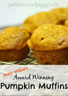 pumpkin muffins on a cooling rack with text overlay that reads, annt mike's award winning pumpkin muffins