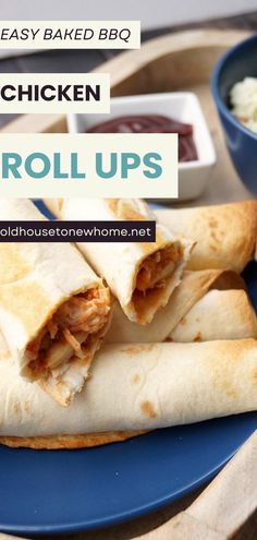 chicken roll ups on a blue plate with dipping sauce