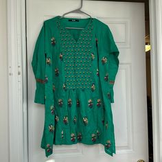 Brand New Khaadi Designer Pakistani Kurta Tunic Size S/M (Slightly Oversized) Full Embroidery Detailing Work On Shirt And Sleeves Green V-neck Kurta With Resham Embroidery, Green V-neck Kurta For Eid, Green Floral Print Long Sleeve Kurta, Green V-neck Resham Embroidery Kurta, Festive Green Floral Print Blouse, Green Tunic Kurta For Eid, Festive Green Blouse With Printed Motifs, Traditional Green V-neck Tunic, Spring Bollywood Style V-neck Kurta