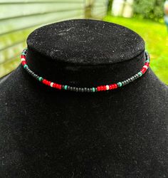 "🌵 matte black, red, white, turquoise ☆ lobster clasp and metal wire ☆ sizes can be from 13in-16in and will have an extension chain ☆ beads are size 8/0 💘13\"-14\" are more like choker sizes ❤️🔥15\"-16\" lay lower on your neck If you have any questions please DM me!!" Black Choker With Lobster Clasp As Gift, Black Choker With Lobster Clasp, Adjustable Red Choker With Round Beads, Black Round Beads Choker For Festival, Adjustable Red Necklace With Black Beads, Adjustable Black Choker With Colorful Beads, White Turquoise, Metal Wire, Dm Me